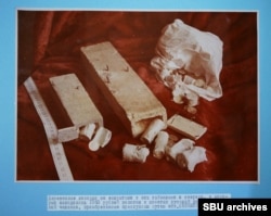 Hollowed-out lengths of timber where rolls of tsarist-era gold coins were hidden.