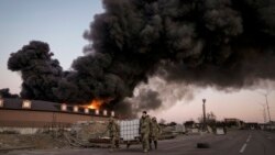 Пожар после обстрела на окраине Киева. 17 марта 2022 года. Фото: AP