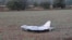 FILE PHOTO: A damaged drone lies after falling in the eastern Polish village of Czosnowka