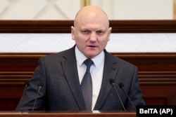 Belarusian KGB Chairman Ivan Tertel addresses Belarus' parliament on May 26, 2021.