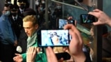 Russian opposition leader Aleksei Navalny is seen at passport control at Moscow's Sheremetyevo airport on January 17, 2021, prior to his detention. 