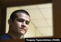 Russian conscript Ramil Shamsutdinov, charged with murder and attempted murder, attends a December 28, 2020 court hearing. He was sentenced to 24 1/2 years in prison in January 2021.