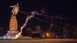 Activists dismantle Ukraine's biggest monument to Vladimir Lenin in the central square of the eastern city of Kharkiv in September 2014.