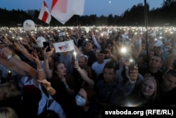 At a campaign rally for presidential candidate Svyatlana Tsikhanouskaya in Minsk on July 30, 2020, supporters use their phone flashlights to signal their desire for political change.