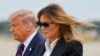 U.S. -- U.S. President Donald Trump walks with first lady Melania Trump at Cleveland Hopkins International Airport in Cleveland, Ohio, U.S., September 29, 2020.
