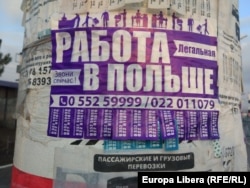 A sign in Chisinau advertises a hotline for "legal" work in Poland, a European Union member. With a Gross Domestic Product per capita of just over $4,510, Moldova ranks as one of the poorest countries in Europe.