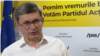 Igor Grosu, leader of Moldova's Action and Solidarity Party, speaks with Current Time Evening anchor Iryna Romaliiska after his party's win (based on preliminary data) in Moldova's July 11 parliamentary elections. 