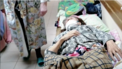 Overwhelmed By COVID-19, Russian Authorities Try To Stop The News Getting Out