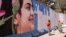 Afghanistan -- Murals painted over in first days of Taliban rule. 