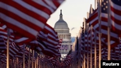 U.S. flags are seen on the National Mall  in Washington, D.C. ahead of January 20, 2021 inauguration ceremonies for President-Elect Joe Biden and Vice President-Elect Kamala Harris. 