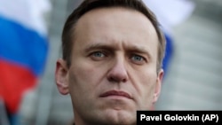 Russian opposition leader Aleksei Navalny taking part in a Moscow march in memory of murdered Kremlin critic Boris Nemtsov on February 29, 2020 