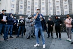 In late April 2020, small-business employees in Kyiv demand that the Ukrainian government lift anti-coronavirus restrictions that have brought their work to a standstill.