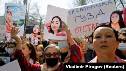 Kyrgyz attend an April 8, 2021 rally in Bishkek to demand the resignation of the interior minister for the alleged inaction of police in response to the kidnapping of Aizada Kanatbekova, who was found murdered.   