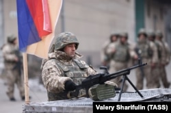 Armenian peacekeepers in Almaty protect a bakery on January 11, 2022.