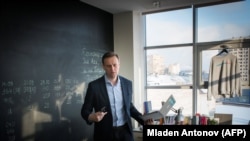 Russian opposition leader Aleksei Navalny poses at the office of his Anti-Corruption Foundation (FBK) in Moscow, January 16, 2018