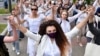 Women dressed in white clothes in Minsk, Belarus on August 12, 2020 protest against police violence during recent rallies against suspected election fraud. 