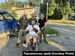 Мария Зайцева со своими сослуживцами в Украине