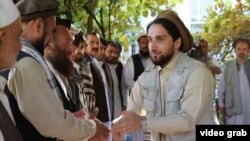 Ahmad Masud, now the leader of Afghanistan's National Resistance Front, meets with supporters in 2019.