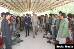 Afghan Ambassador to Tajikistan Muhammad Zaher Aghbar visits a refugee camp for Afghan soldiers in Tajikistan. (Credit: Facebook/Amb. Muhammad Zaher Aghbar )