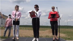 Veranika Tsapkala, Svyatlana Tsikhanouskaya, and Maryya Kalesnikava at a July 19 rally in Minsk