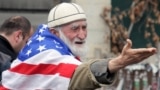 A Georgian demonstrator, known for his affinity for the U.S. flag, attends a 2014 anti-Russia rally in Tbilisi, Georgia.  