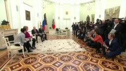 Что обсуждали в Москве Путин и Меркель