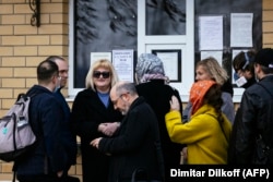 Navalny lawyers Olga Mikhailova (3rd-left), Vadim Kobzev (2nd, left), and physician Dr. Anastasia Vasilyeva (5th-left) wait on April 20, 2021 for potential entrance into the IK-3 penal colony, where the jailed Aleksei Navalny has been transferred.