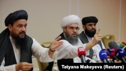Taliban representatives Abdul Latif Mansoor (left), Shahabuddin Delawar, and Suhail Shaheen attend a July 9, 2021 news conference in Moscow, Russia. 
